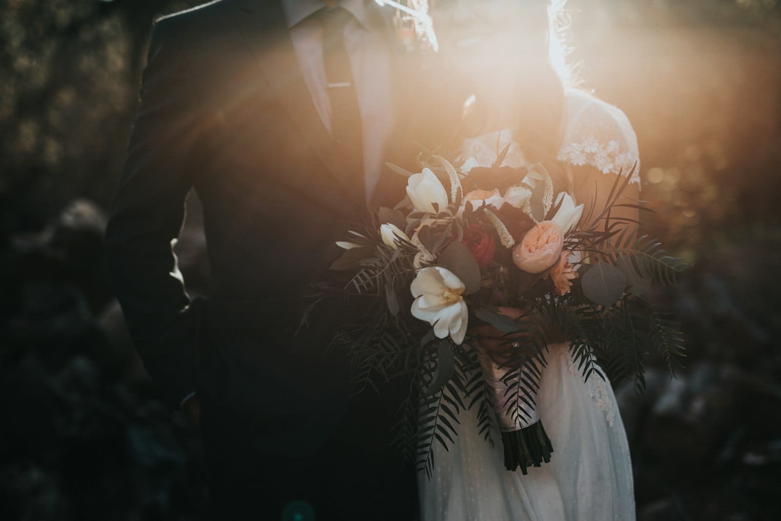 Couple exchanging rings during their wedding ceremony